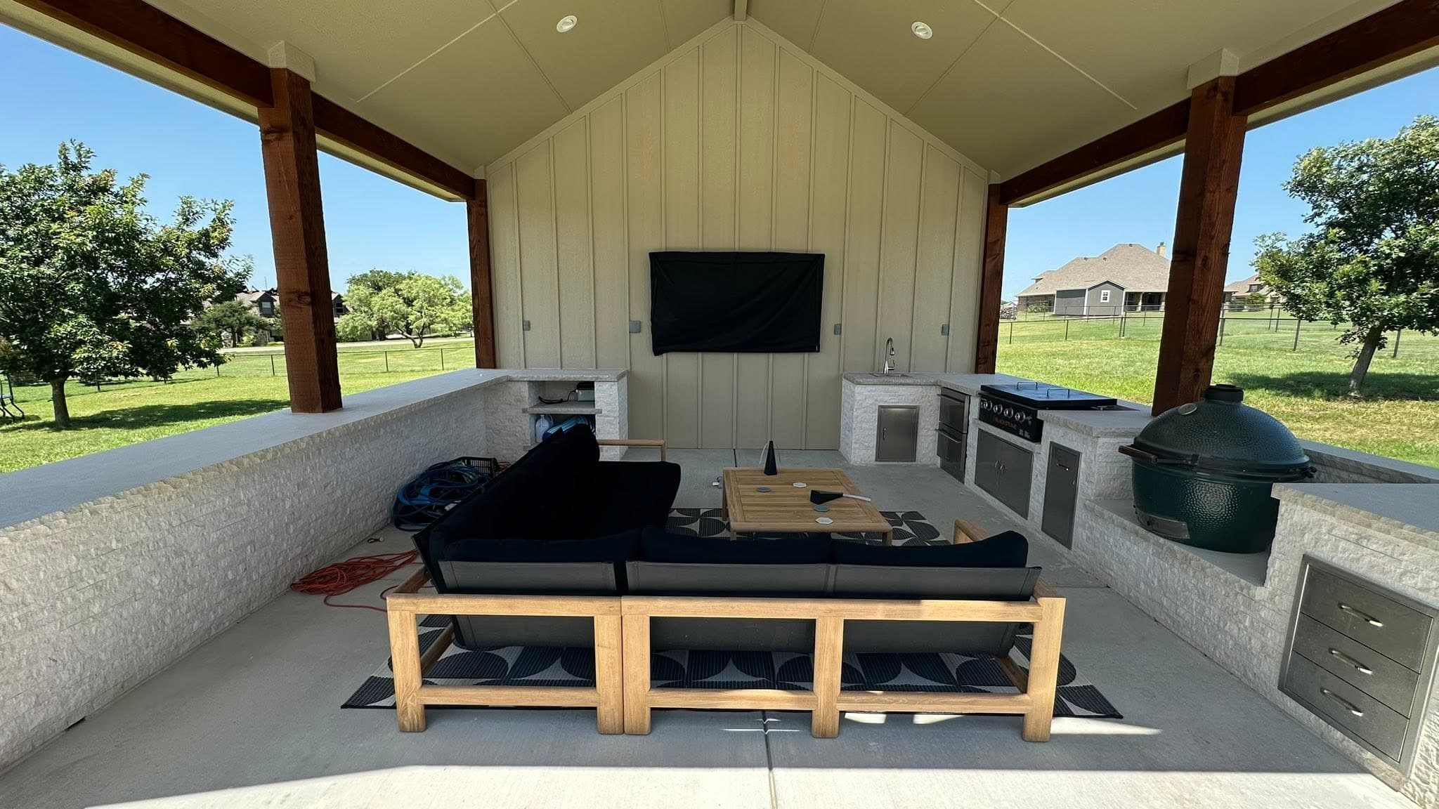 Poolside patio and covered gathering space