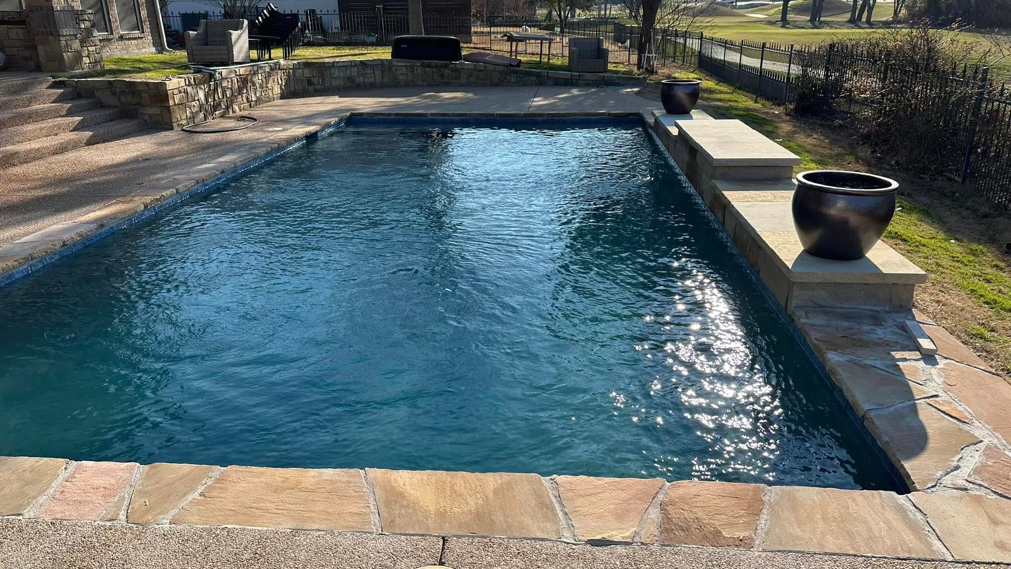 Clear water moving through a completed pool and spa